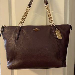 Coach Mid size brown leather purse with gold chain shoulder strap. Used like new